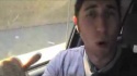 0290-DanielTalkingToCameraInTheCar.jpg