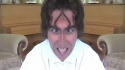 0197-DanielPlayingWithCamera-Cropped.jpg